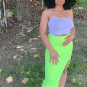 neon skirt with a modest slit in the front!